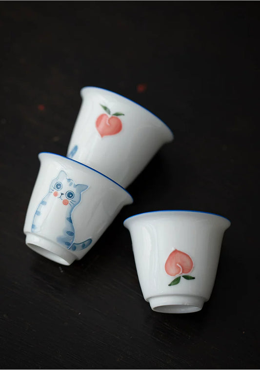 Vaso de Té de Cerámica con Diseño de Gato y Melocotón